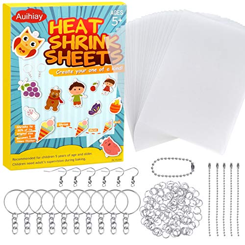 Auihiay Juego de 145 hojas de plástico termorretráctiles que incluye 20 piezas de papel de arte Shrinky con 125 piezas de llaveros accesorios para manualidades creativas para niños