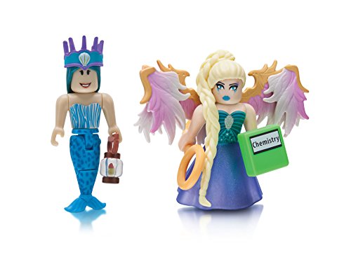 Roblox Colección de celebridades - Neverland Lagoon: Crown Collector + Royale High School: Enchantress Paquete de dos figuras [Incluye 2 artículos virtuales exclusivos]