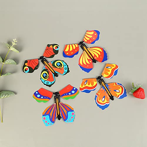 Conruich - 10 piezas de juguete mágico de mariposa voladora, creativo y colorido, para niños, juguete mariposa enrollable, banda de goma, con mariposa, regalo sorpresa para fiesta de cumpleaños, boda