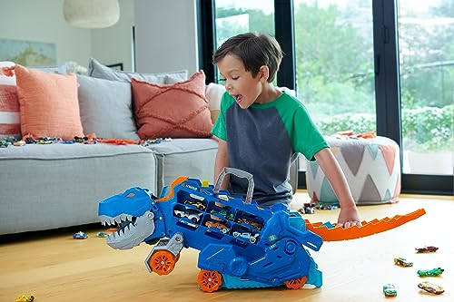 Hot Wheels City Camión T-Rex definitivo Dinosaurio transporte y pista para coches de juguete, incluye 2 vehículos, +4 años (Mattel HNG50)