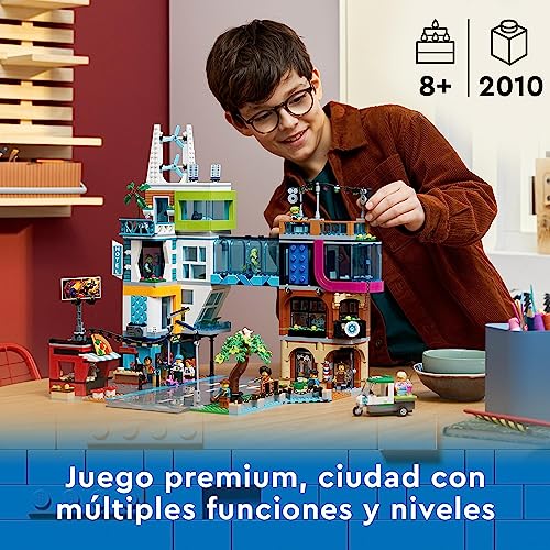 LEGO 60380 City Centro de la Ciudad, Kit de Construcción del Modelo con Habitaciones Modulares Combinables, Incluye Tiendas de Juguetes, Barbería, Hotel y Discoteca en la Azotea con 14 Minifiguras