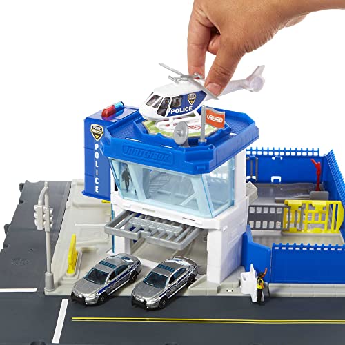 Matchbox Action Drivers Estación de policía Set de juego con pistas para coches de juguete con sonidos, incluye 1 vehículo y 1 helicóptero, +3 años (Mattel HHW22)