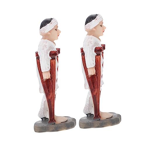 STOBOK 2 Piezas Hombre con Muletas Suministros De Mesa De Arena Psicologica Decoración De Mesa De Arena Psicológica Miniatura Resina Suministros para Mesas De Arena Blanco