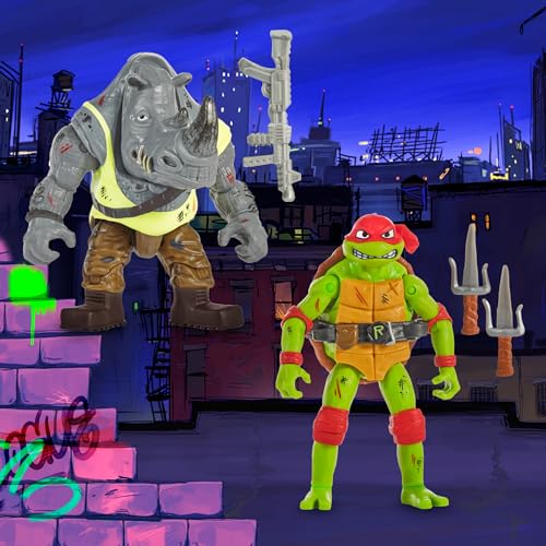 TORTUGAS NINJA - Raphael Vs. Rocksteady Movie Face Off 2 Pack, Figuras de Acción Articuladas 12 cm, Personajes de la Película Caos Mutante con Accesorios de Combate, para niños y niñas Desde 4 Años